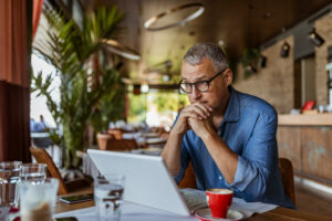 The man thinking while work in home at New Westminster, BC