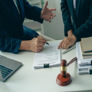 A lawyer guiding another individual through a bankruptcy declaration in British Columbia